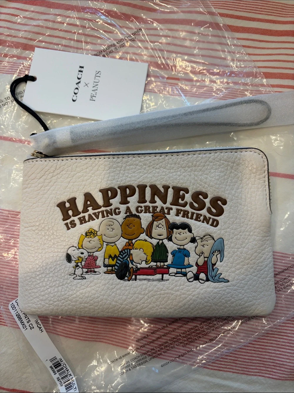 Coach Wristlet Clutch in Cream with Black Accent